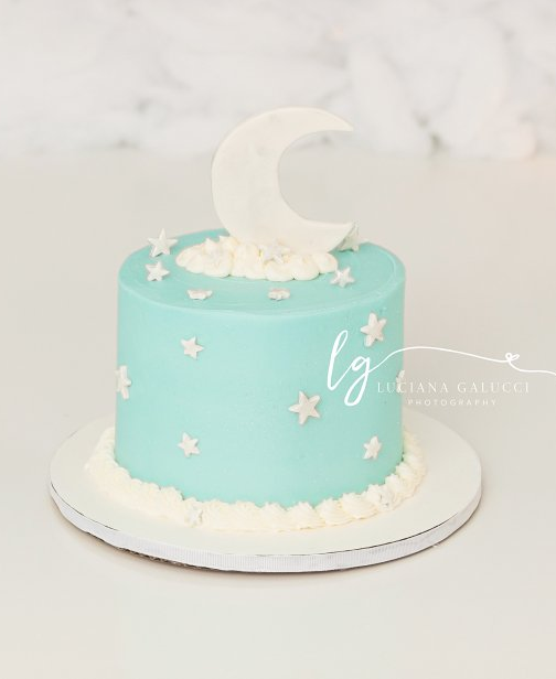 stars and moon themed cake portraits for a cake smash session in studio - Cary NC