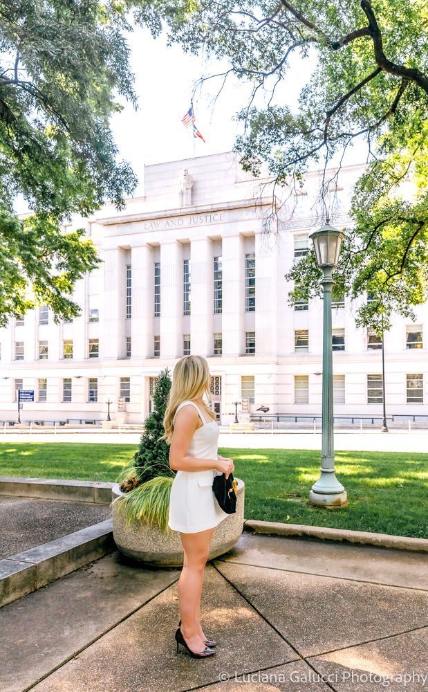 Graduation portrait session by Luciana Galucci Photography at Campbell University School of Law in Raleigh, North Carolina featuring cap and gown near the courthouse