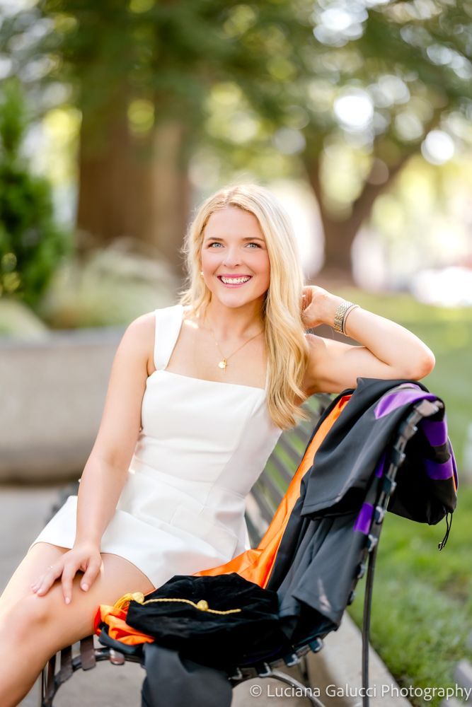 Graduation portrait session by Luciana Galucci Photography at Campbell University School of Law in Raleigh, North Carolina featuring cap and gown near the courthouse