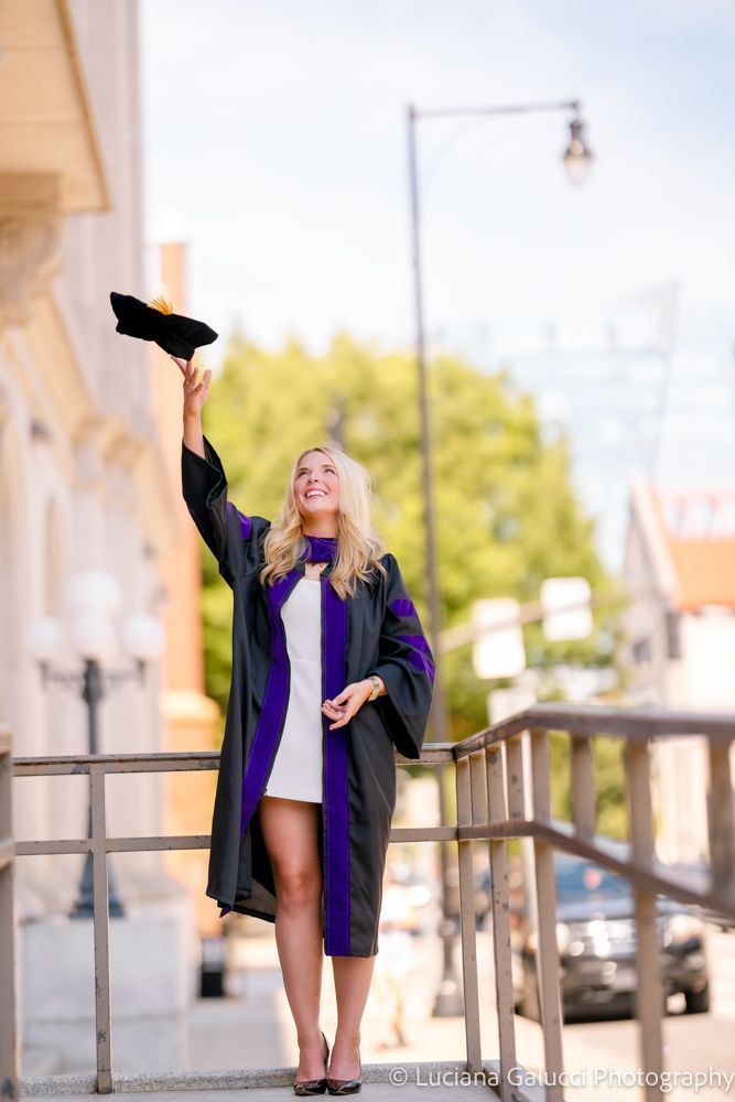 Graduation portrait session by Luciana Galucci Photography at Campbell University School of Law in Raleigh, North Carolina featuring cap and gown near the courthouse
