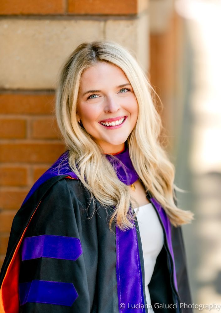 Graduation portrait session by Luciana Galucci Photography at Campbell University School of Law in Raleigh, North Carolina featuring cap and gown near the courthouse