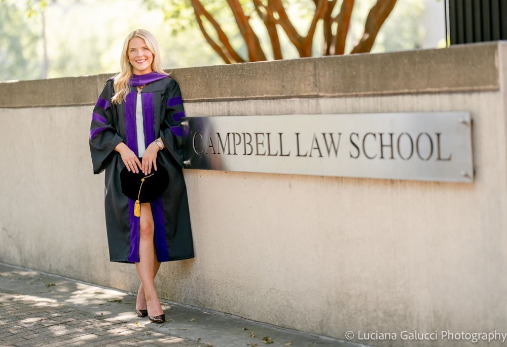 Graduation portrait session by Luciana Galucci Photography at Campbell University School of Law in Raleigh, North Carolina featuring cap and gown near the courthouse