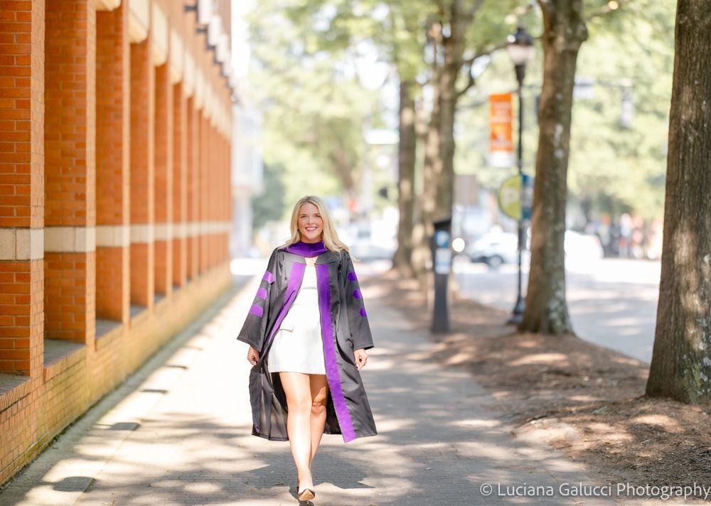 Graduation portrait session by Luciana Galucci Photography at Campbell University School of Law in Raleigh, North Carolina featuring cap and gown near the courthouse