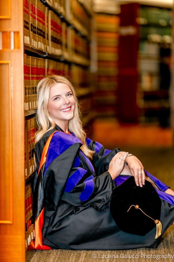 Graduation portrait session by Luciana Galucci Photography at Campbell University School of Law in Raleigh, North Carolina featuring cap and gown near the courthouse