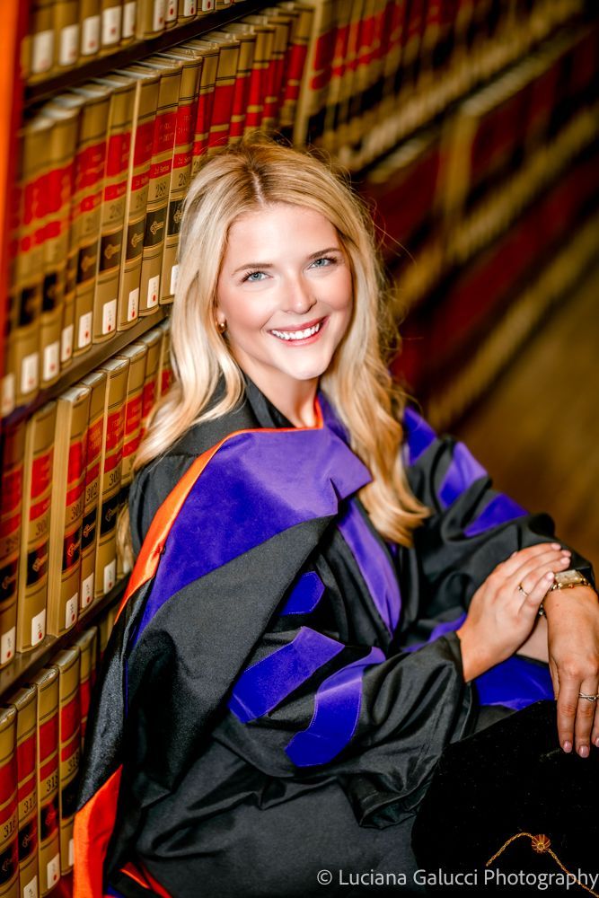 Graduation portrait session by Luciana Galucci Photography at Campbell University School of Law in Raleigh, North Carolina featuring cap and gown near the courthouse