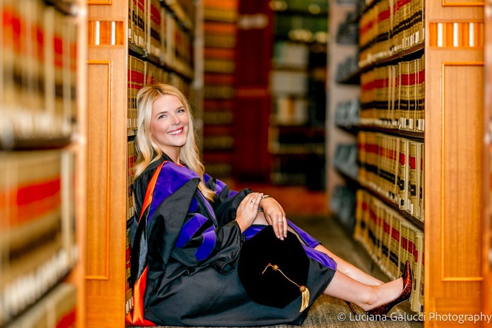 Graduation portrait session by Luciana Galucci Photography at Campbell University School of Law in Raleigh, North Carolina featuring cap and gown near the courthouse