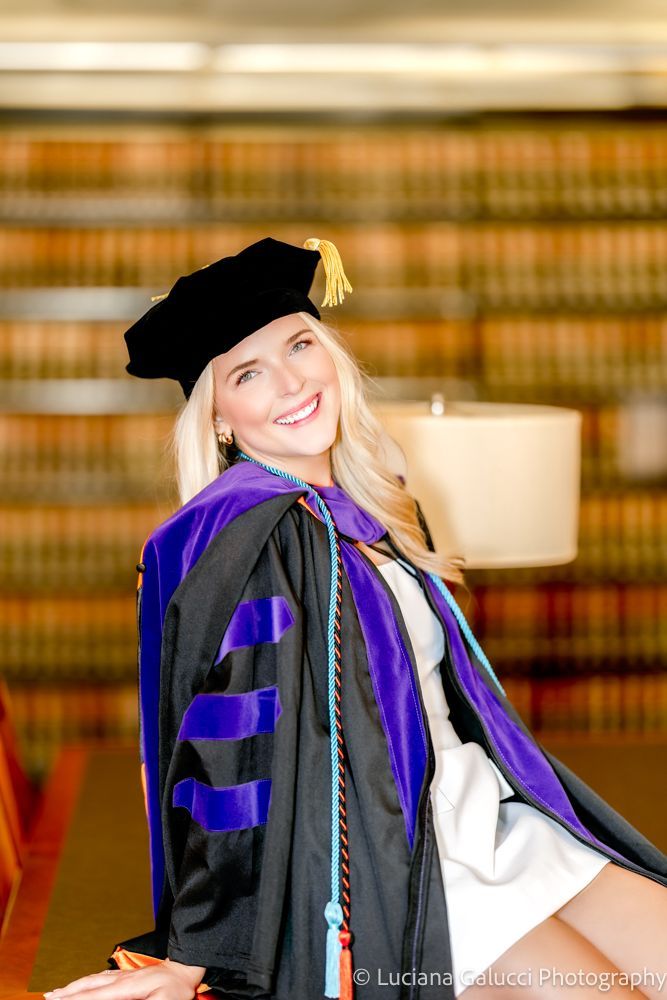 Graduation portrait session by Luciana Galucci Photography at Campbell University School of Law in Raleigh, North Carolina featuring cap and gown near the courthouse