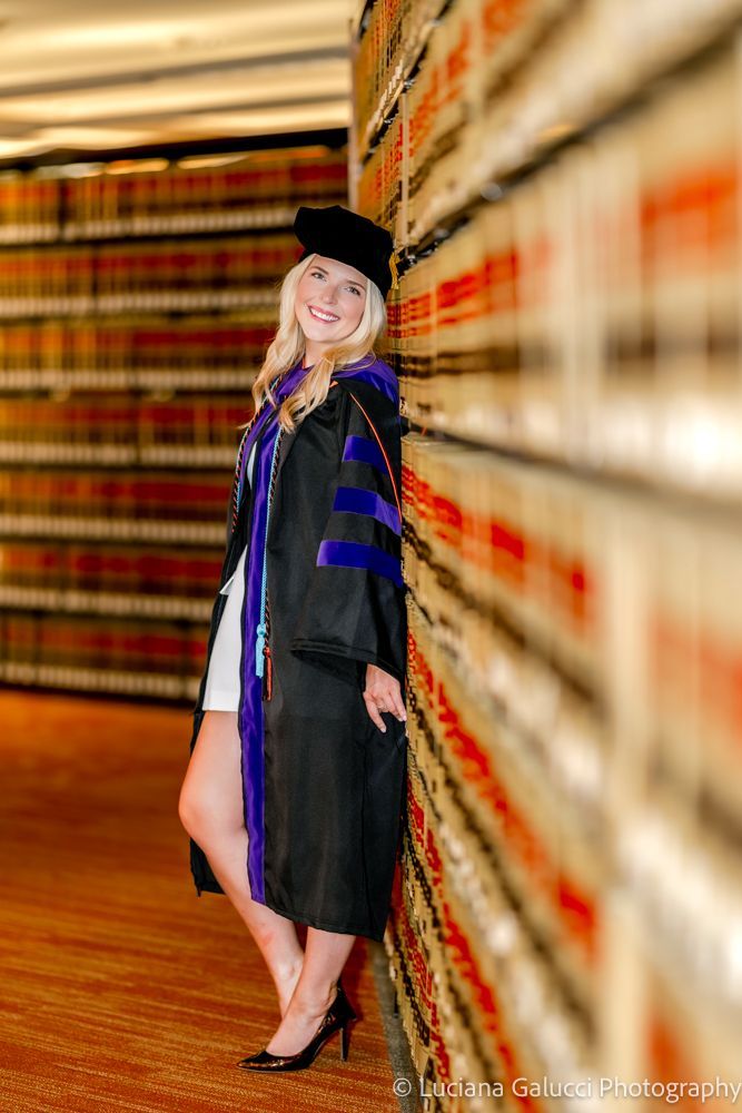 Graduation portrait session by Luciana Galucci Photography at Campbell University School of Law in Raleigh, North Carolina featuring cap and gown near the courthouse