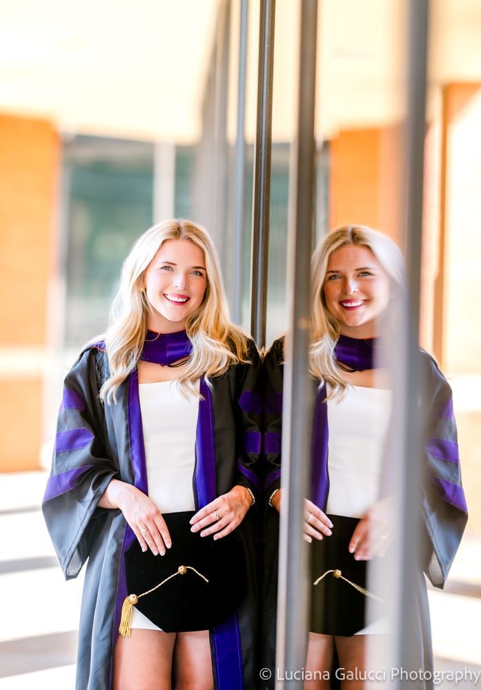 Graduation portrait session by Luciana Galucci Photography at Campbell University School of Law in Raleigh, North Carolina featuring cap and gown near the courthouse
