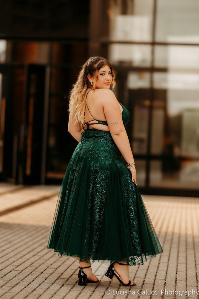 High school prom portraits in downtown Raleigh featuring elegant styling and natural light
