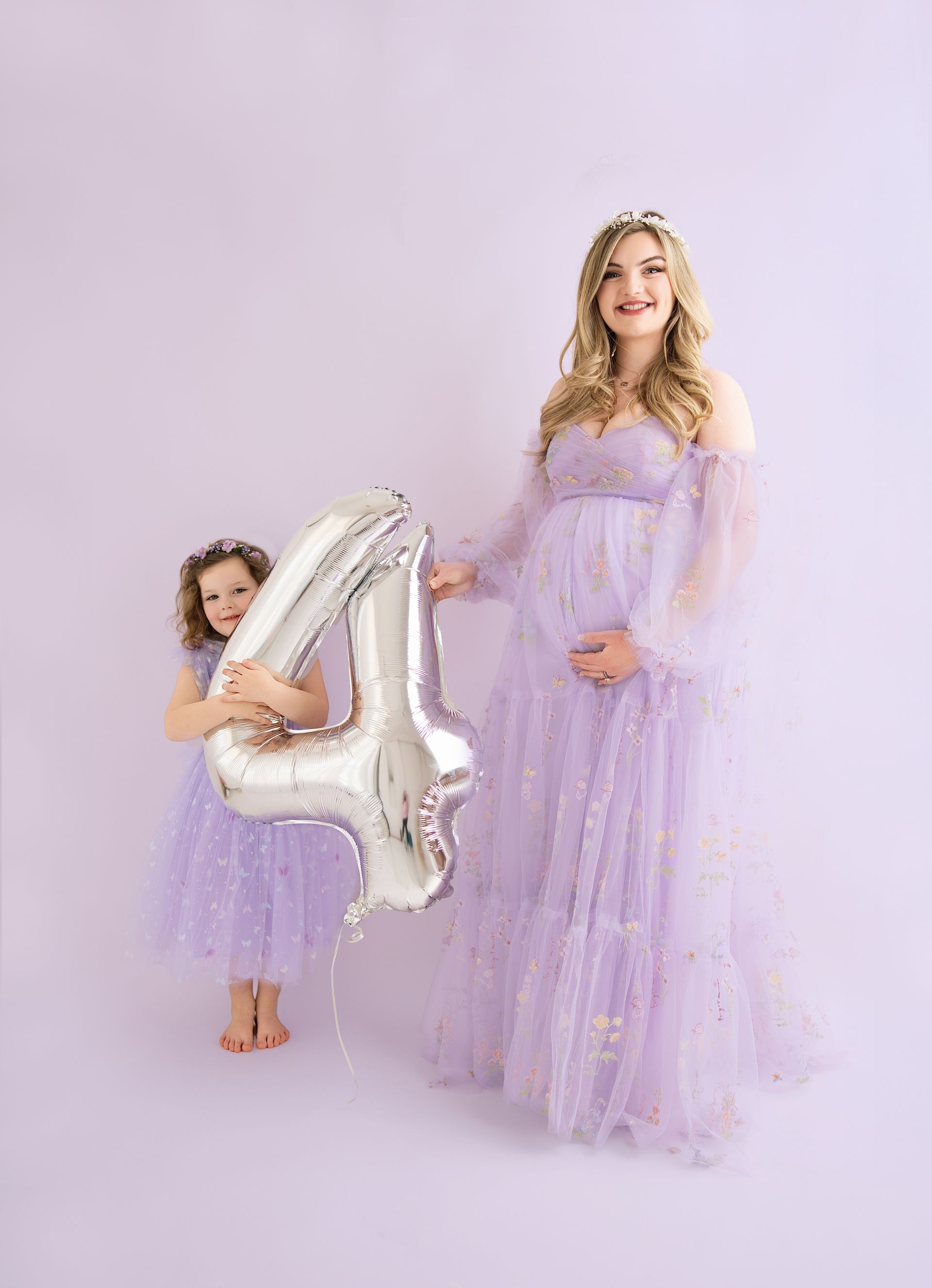Purple-themed birthday session with 4 balloon for big sister milestone photos