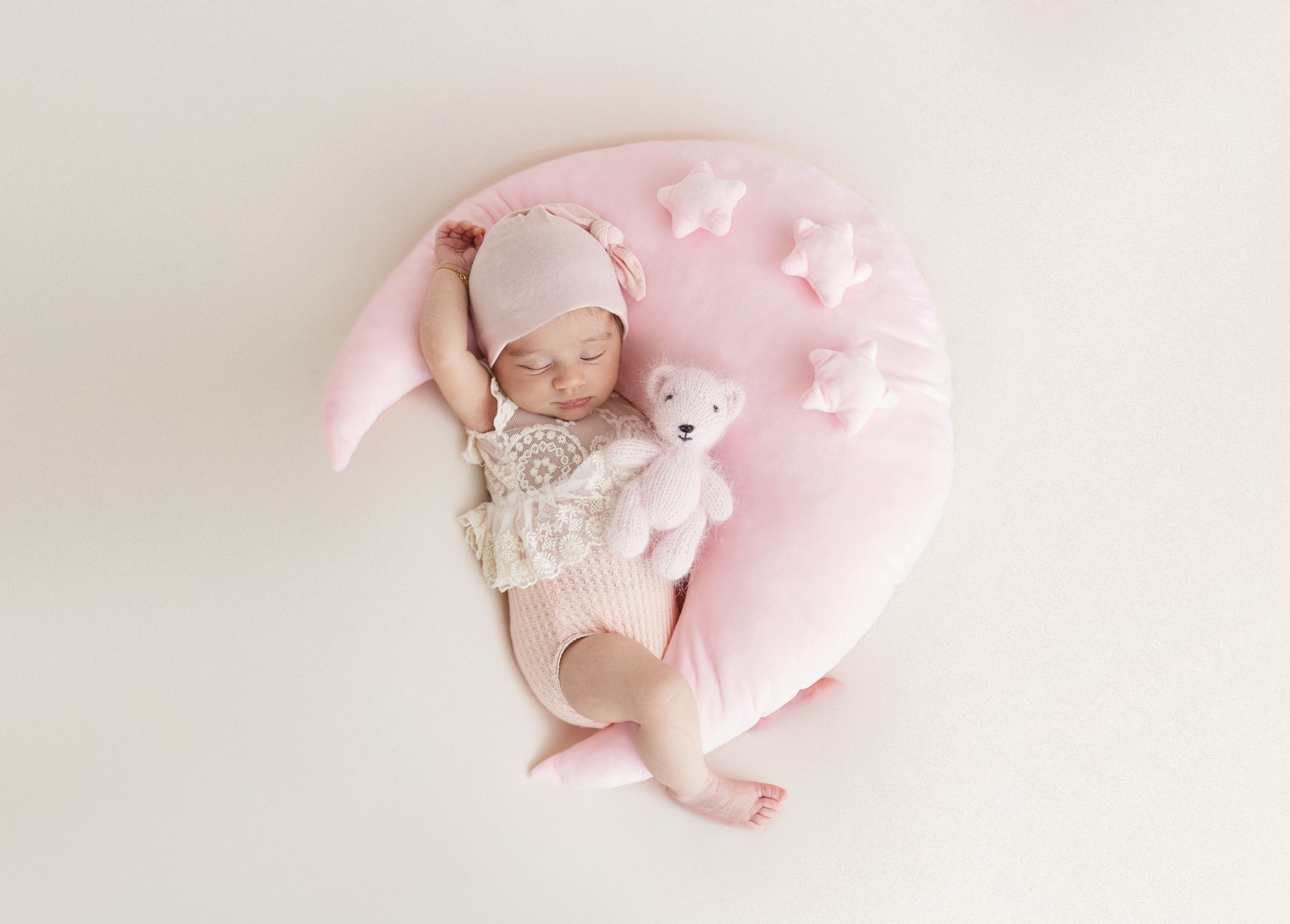 High-resolution newborn girl photo in cozy Cary
 photography studio