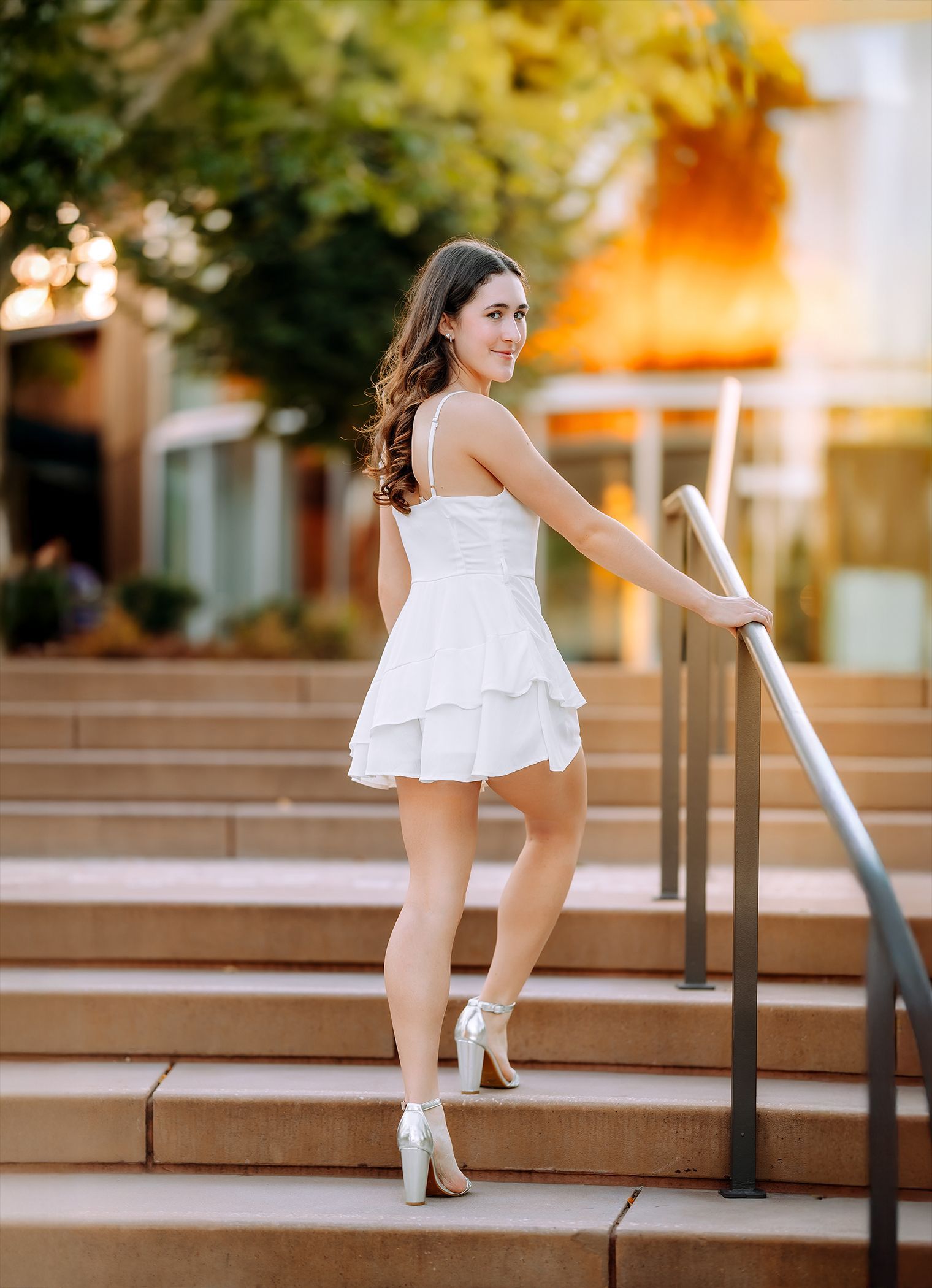 High school senior portrait at Cary Downtown Park during golden hour in Cary, North Carolina
