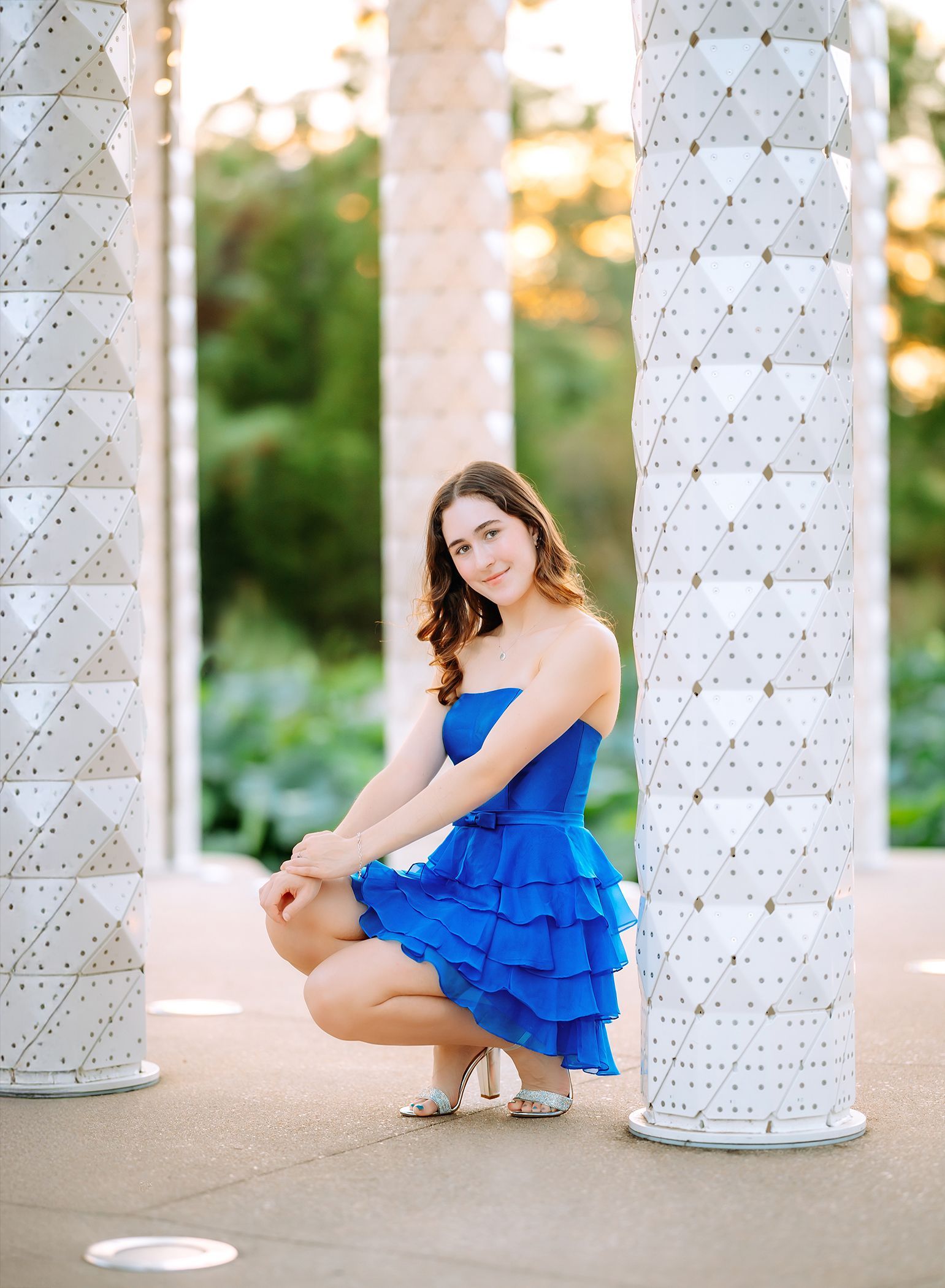High school senior portrait at Cary Downtown Park during golden hour in Cary, North Carolina
