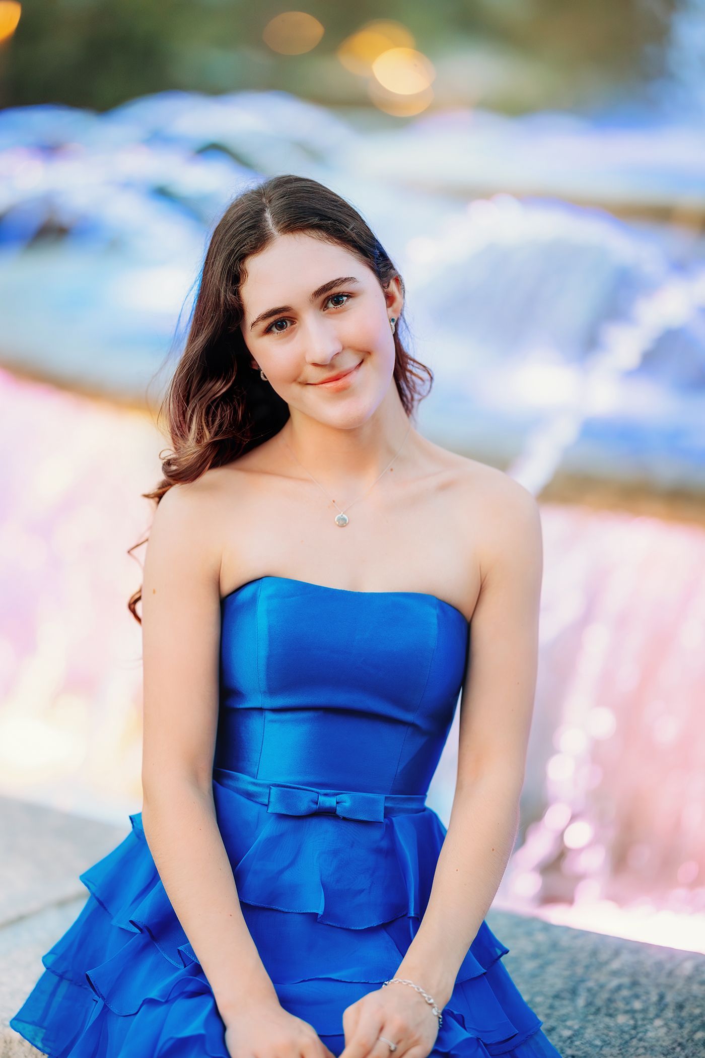 High school senior portrait at Cary Downtown Park during golden hour in Cary, North Carolina
