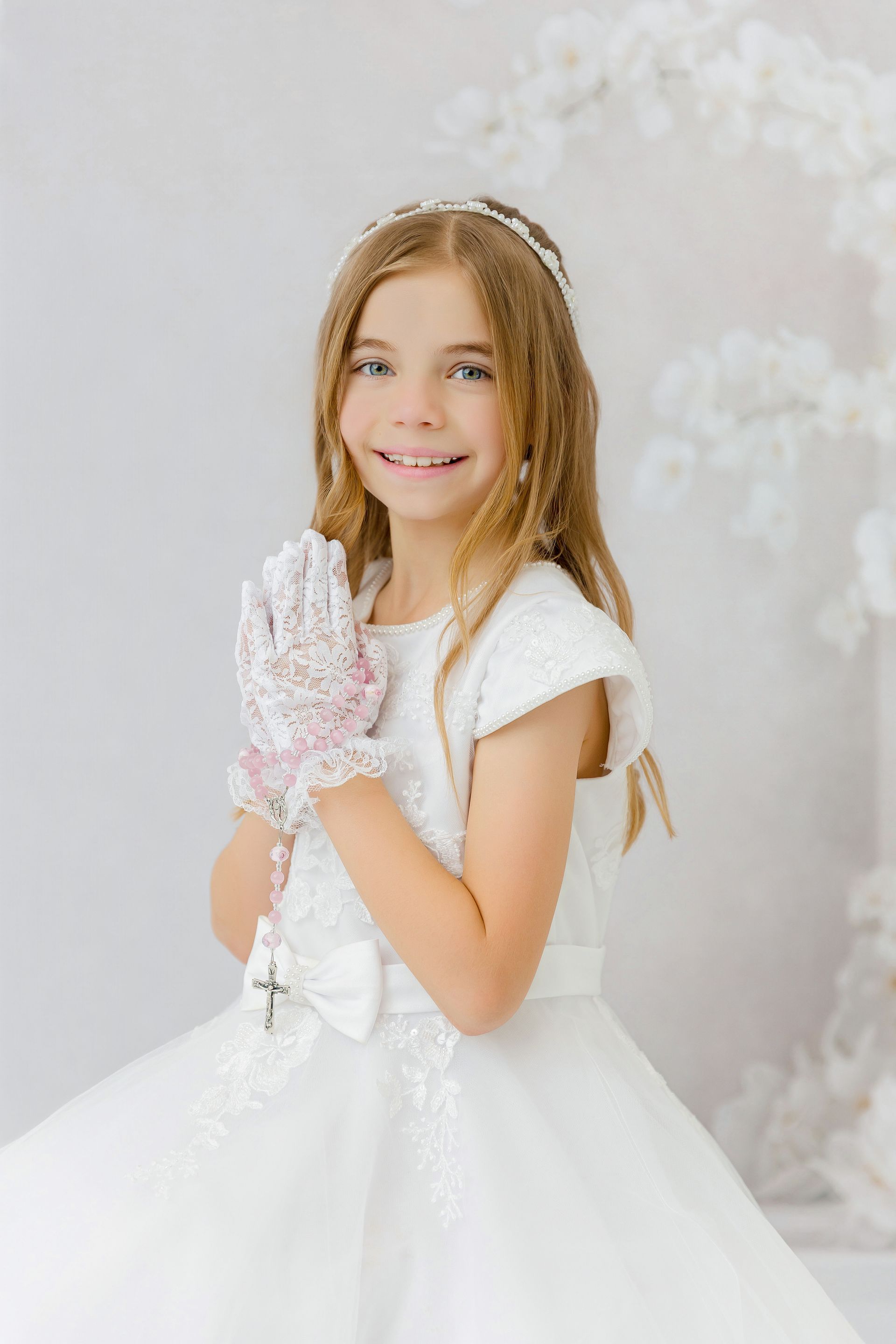 first communion girl white dress portrait