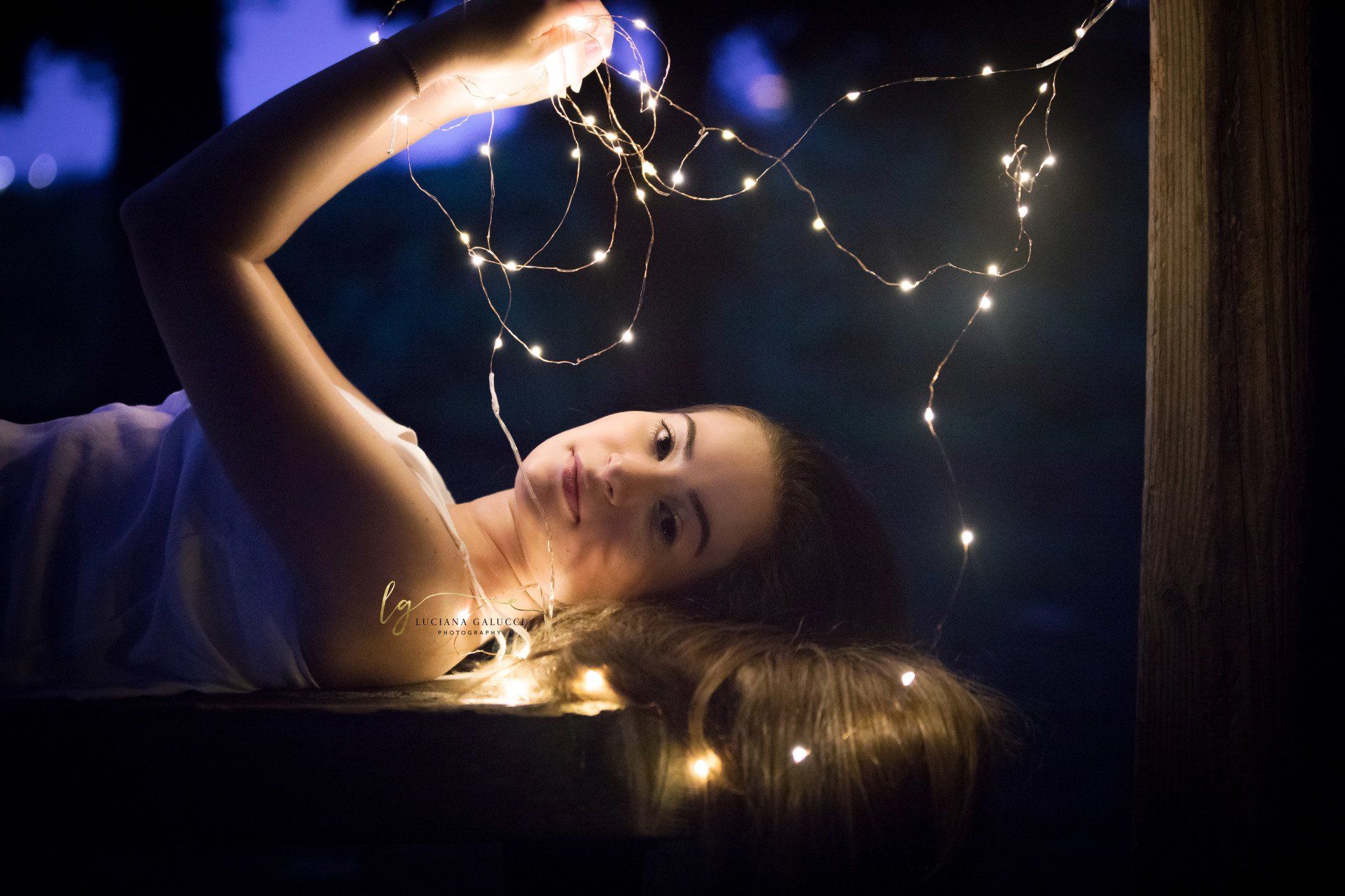 Golden hour senior portrait session in a sunflower field at Dix Park in Raleigh, North Carolina
