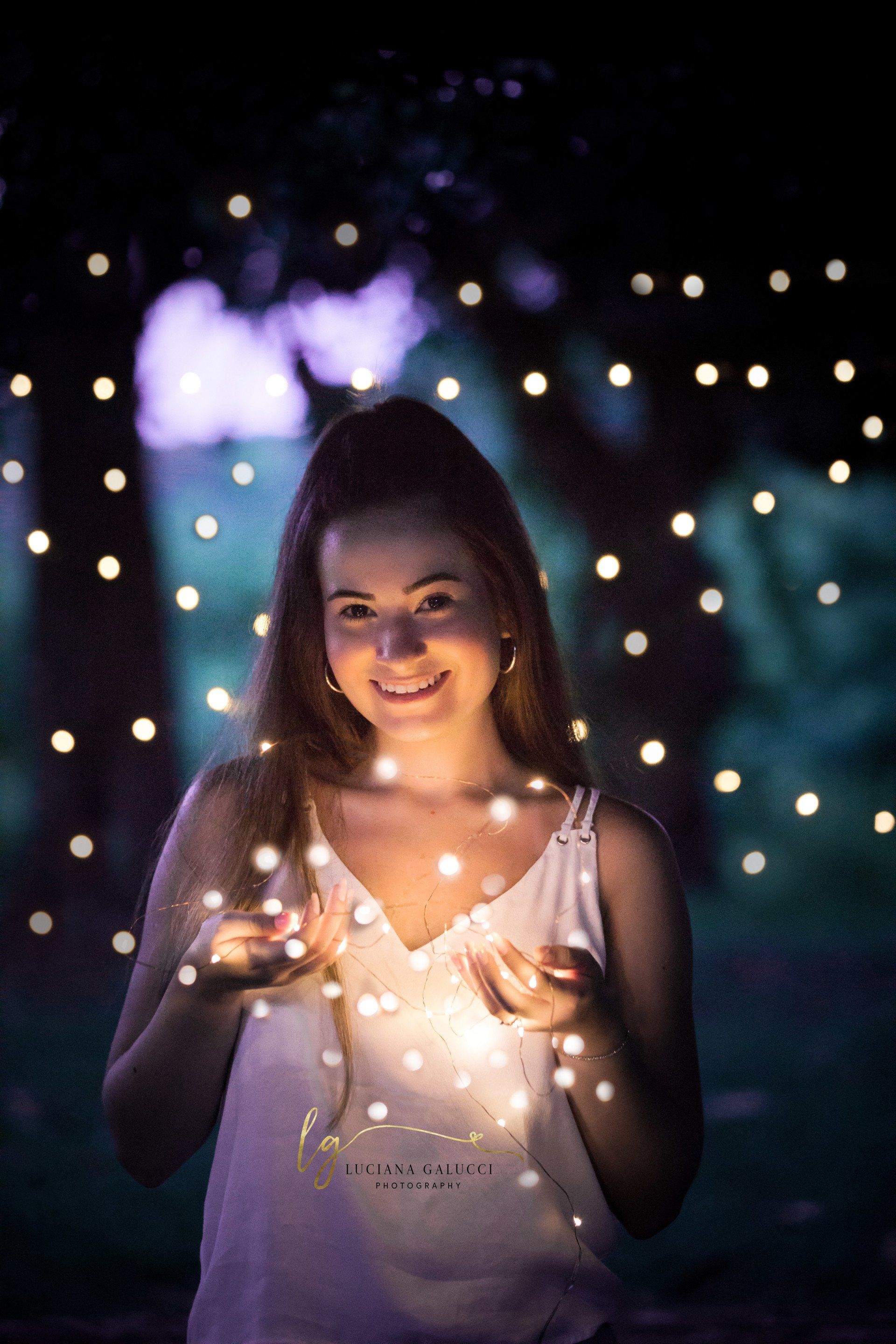 Golden hour senior portrait session in a sunflower field at Dix Park in Raleigh, North Carolina
