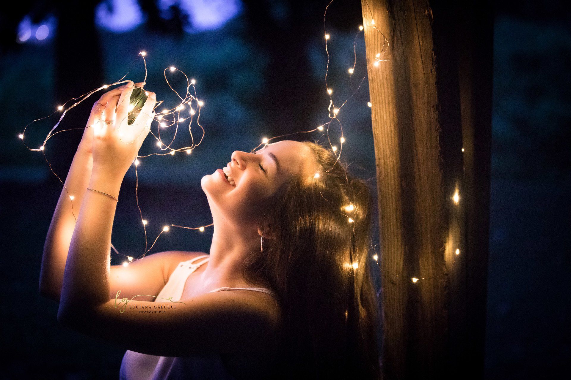 Golden hour senior portrait session in a sunflower field at Dix Park in Raleigh, North Carolina
