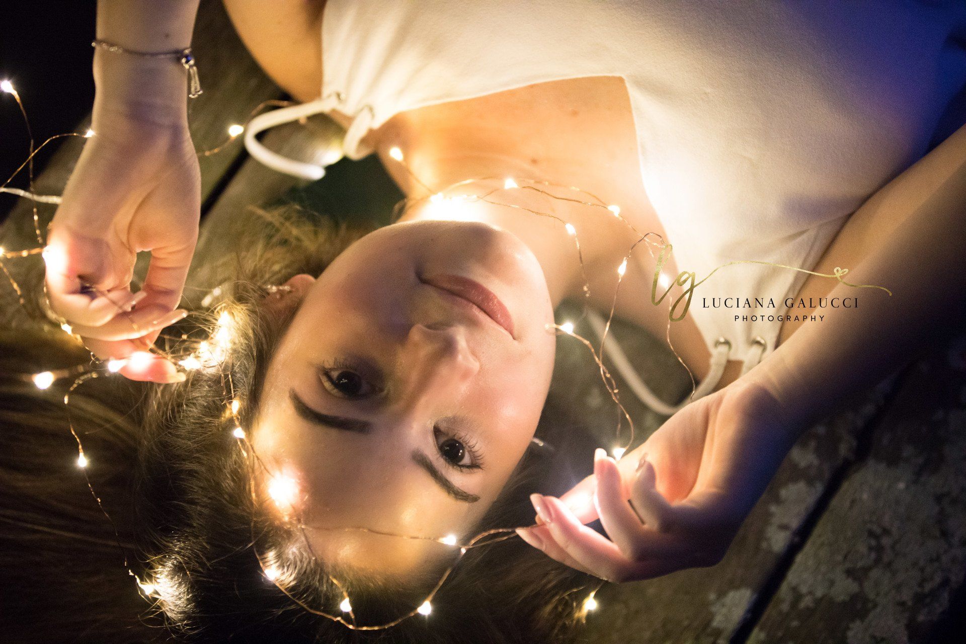 Golden hour senior portrait session in a sunflower field at Dix Park in Raleigh, North Carolina
