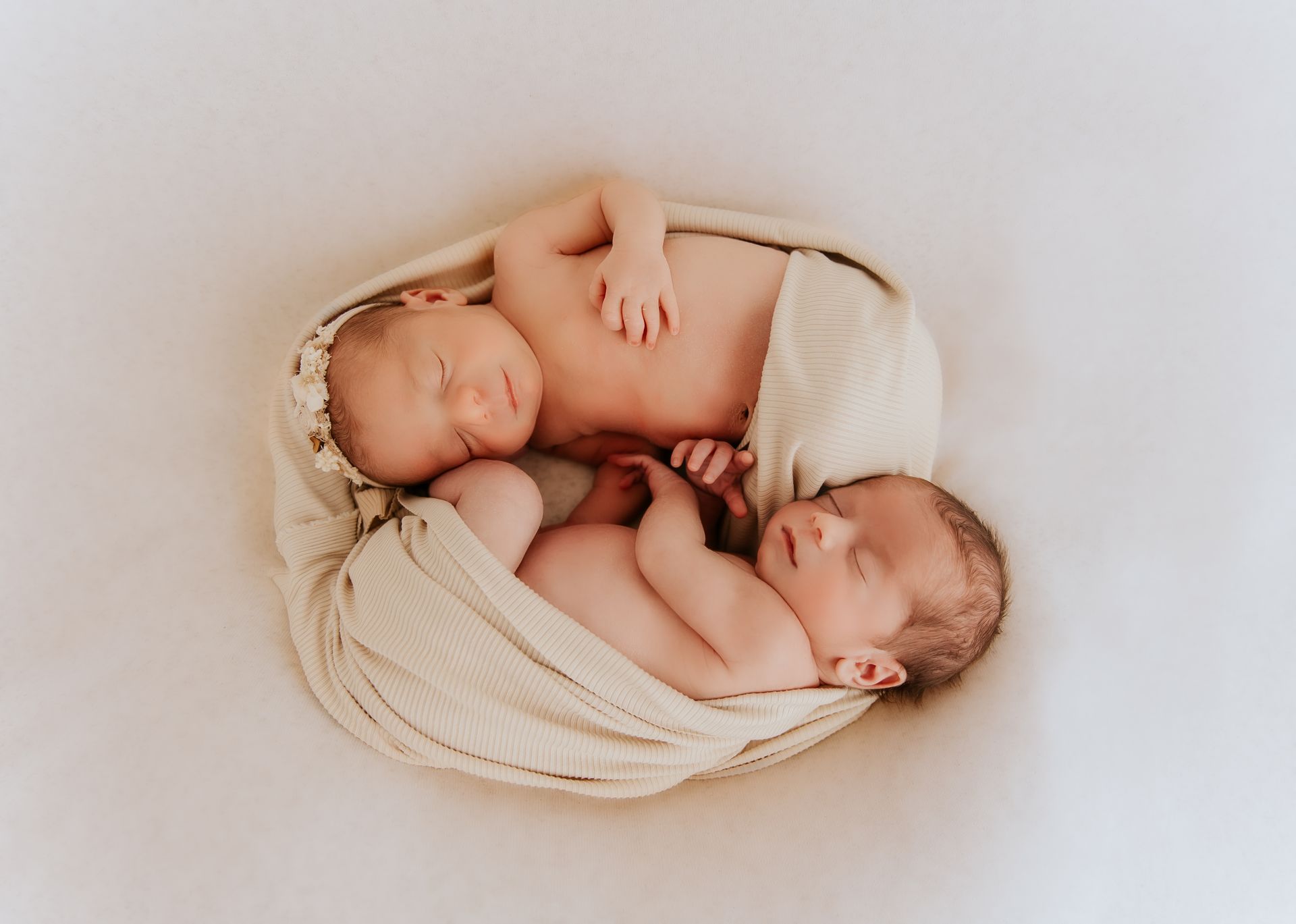 Luxury newborn studio session, calm and baby-led experience in Cary NC
