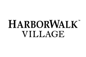 The harborwalk village logo is black and white on a white background.