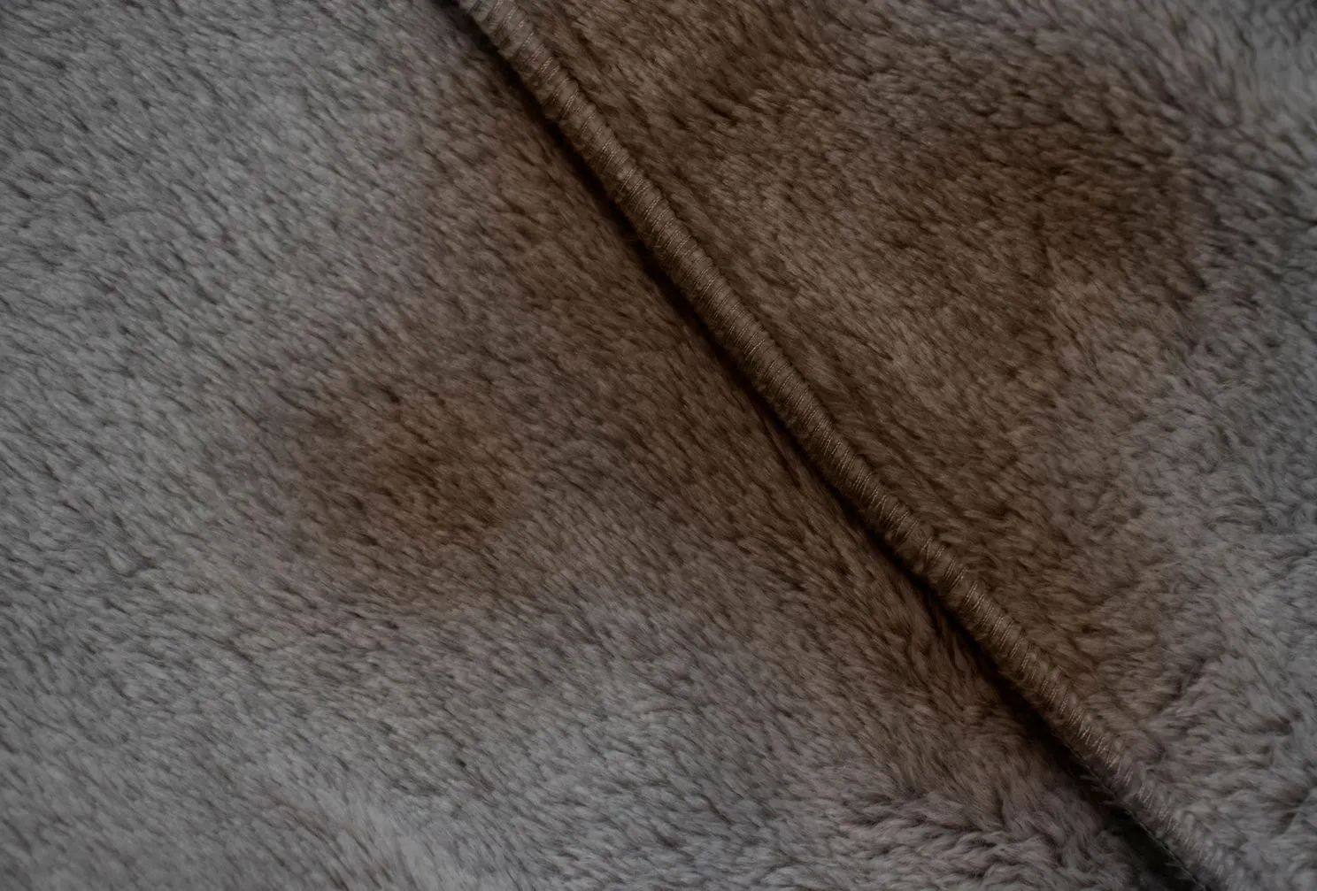 A close up of a piece of brown fur.