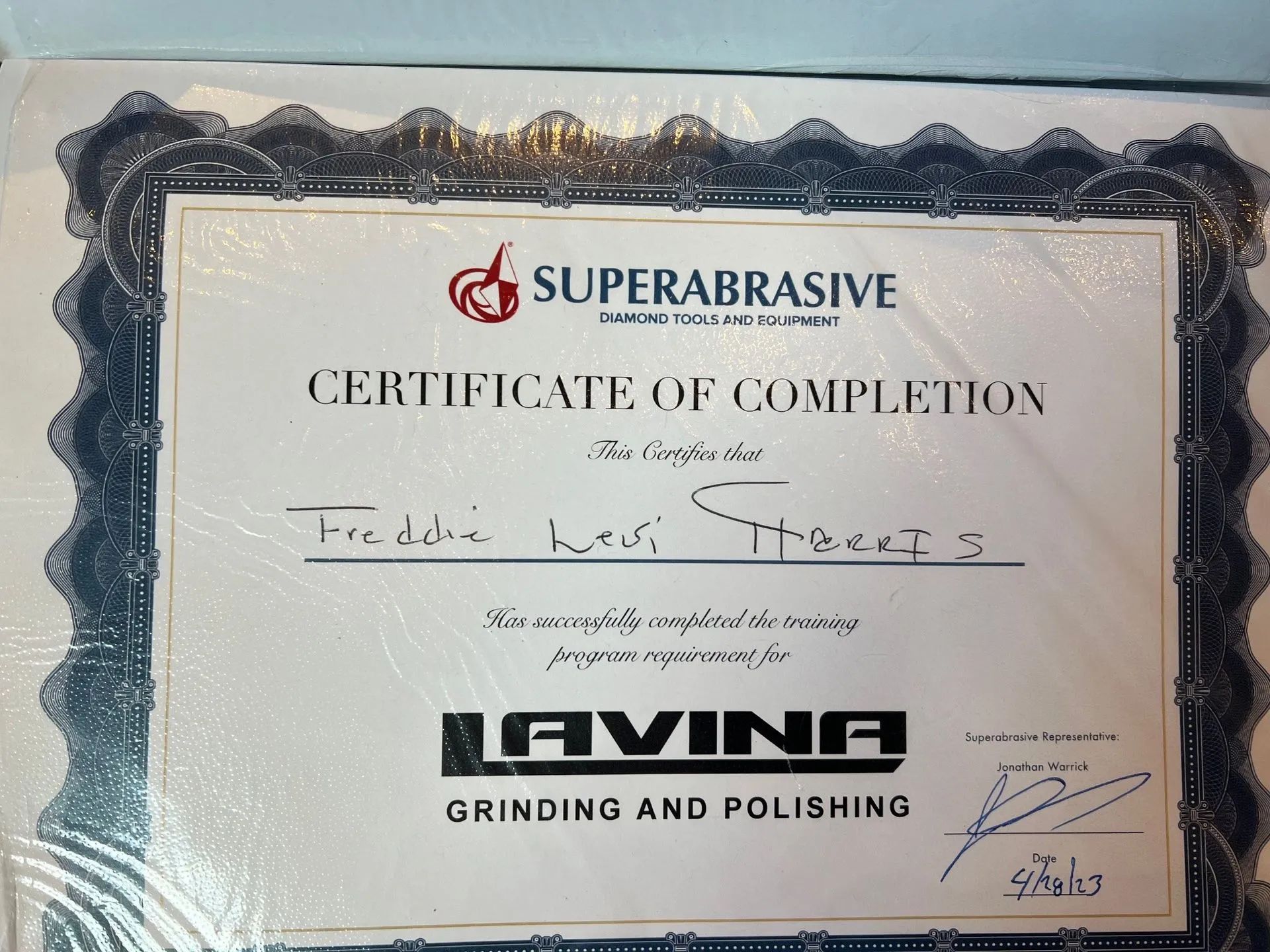A superabrasive certificate of completion for grinding and polishing