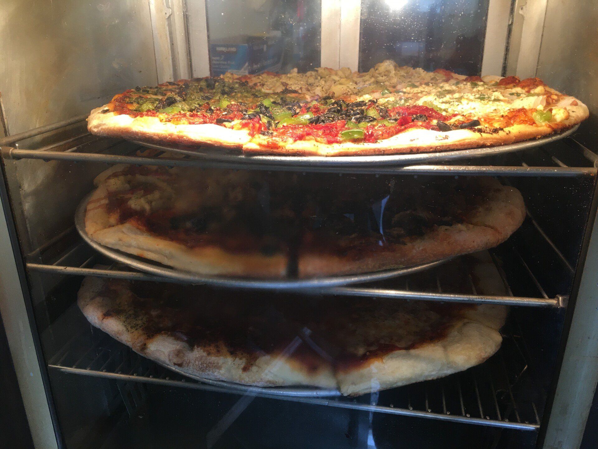 Pizza with Pepperoni Sausage and Bacon — Port Townsend, WA — Waterfront Pizza Inc.