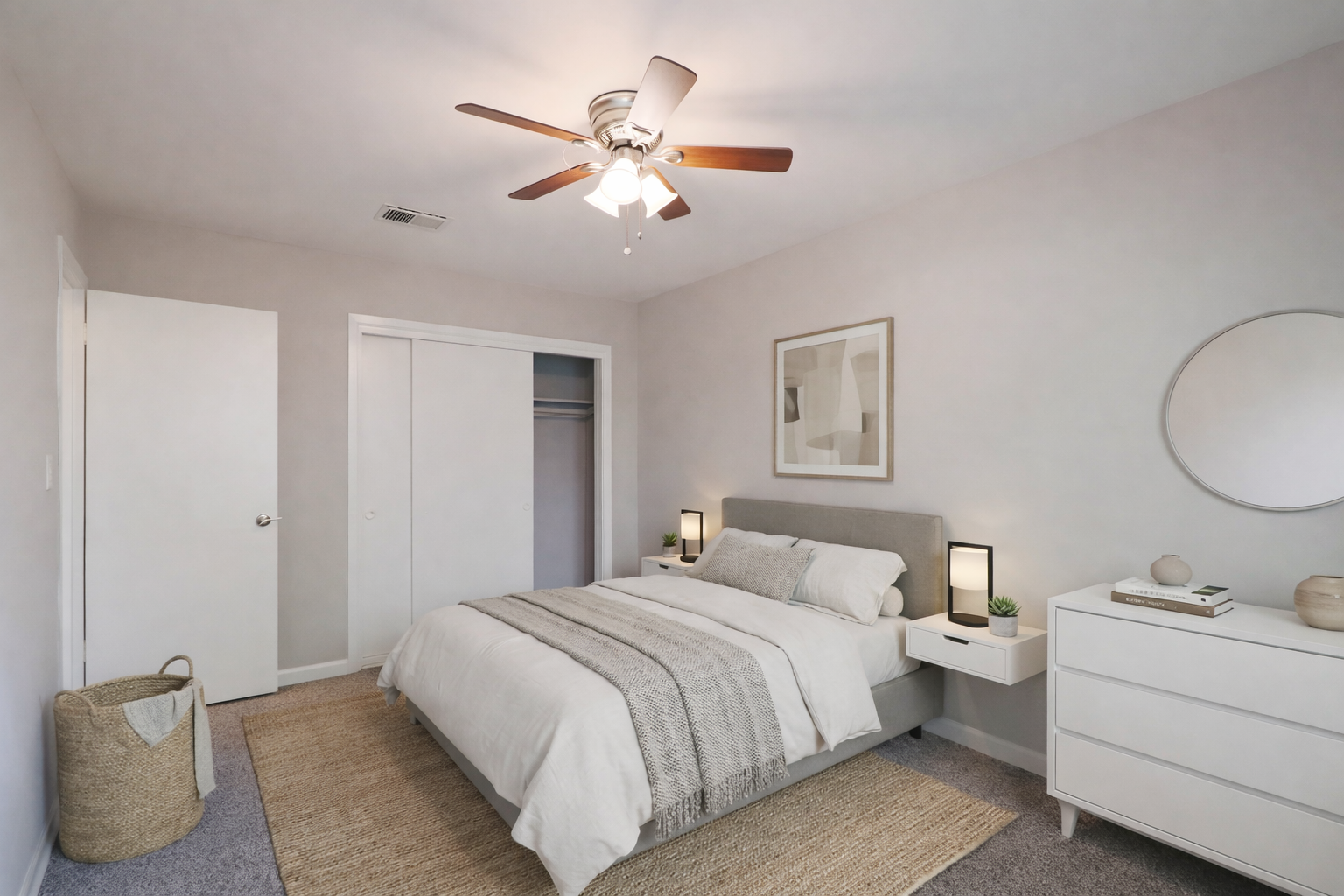 Bedroom with ceiling fan at KENCO Briarcliff apartments