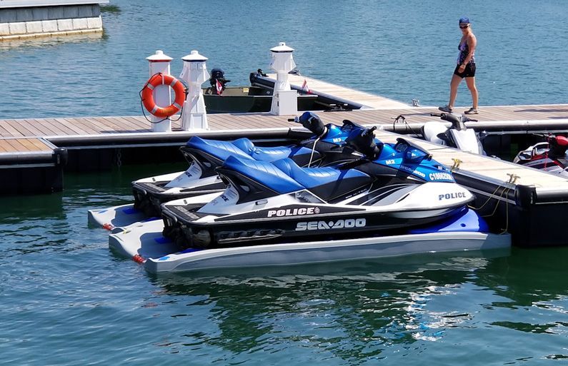 An image of jet skis parked on DockinaPort Ride-On Systems