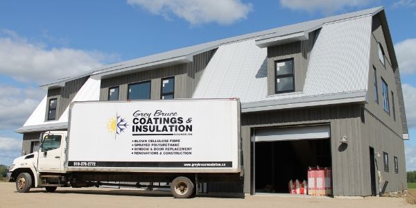 An image of the Grey Bruce Coatings and Insulation company truck and warehouse