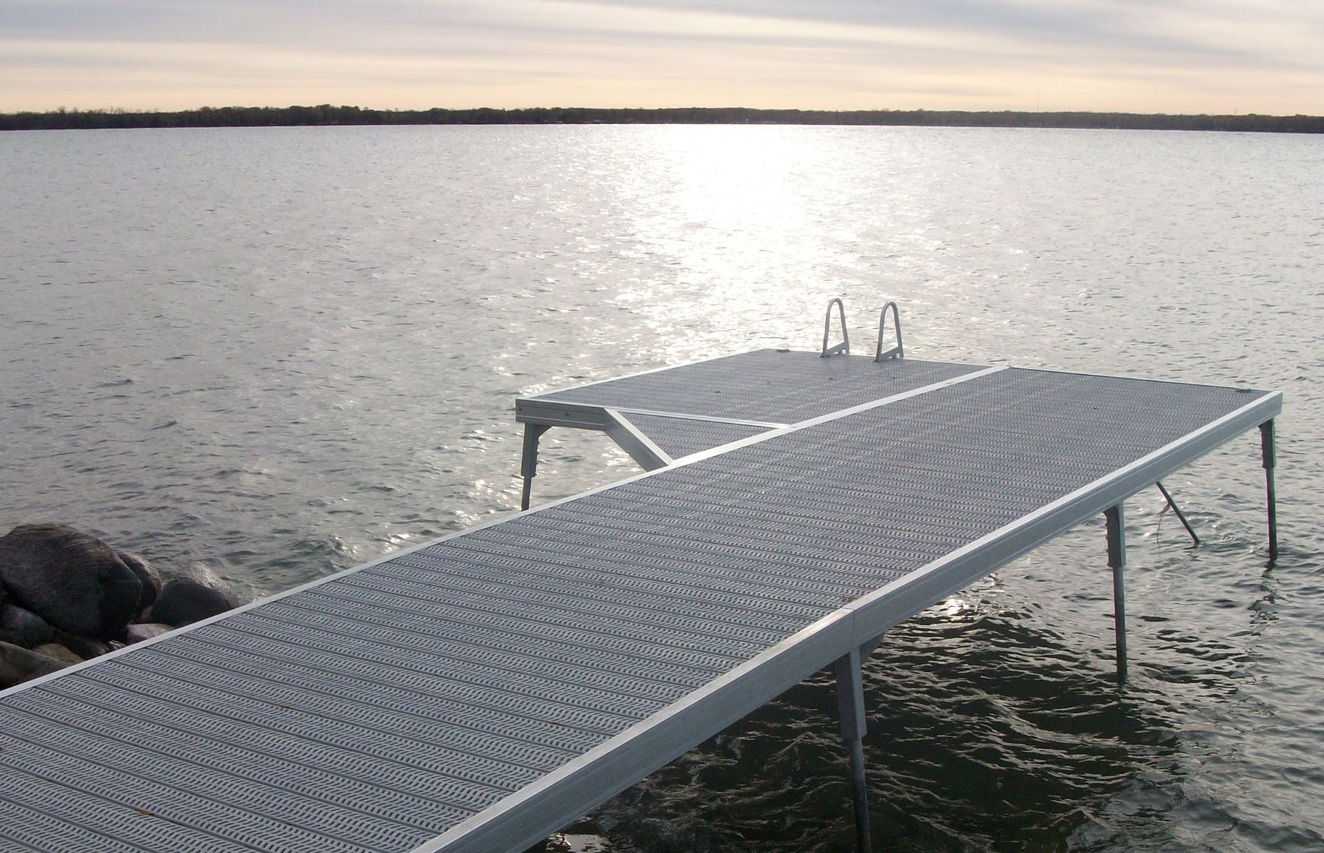 A standard duty pipe dock leading onto the water
