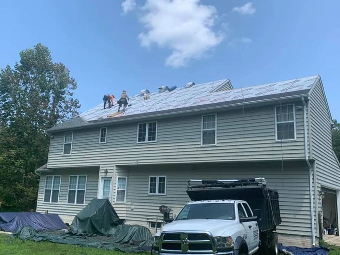 Men Installing Roof — Fredericksburg, VA — John Mills JR Roofing Co.