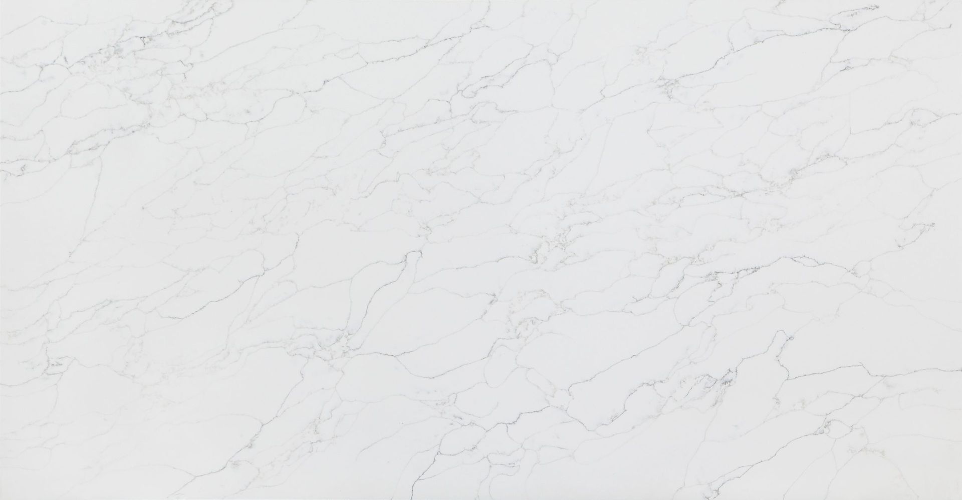 White quartz countertop with subtle gray veining.