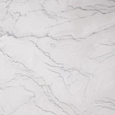 White marble countertop with gray veining.