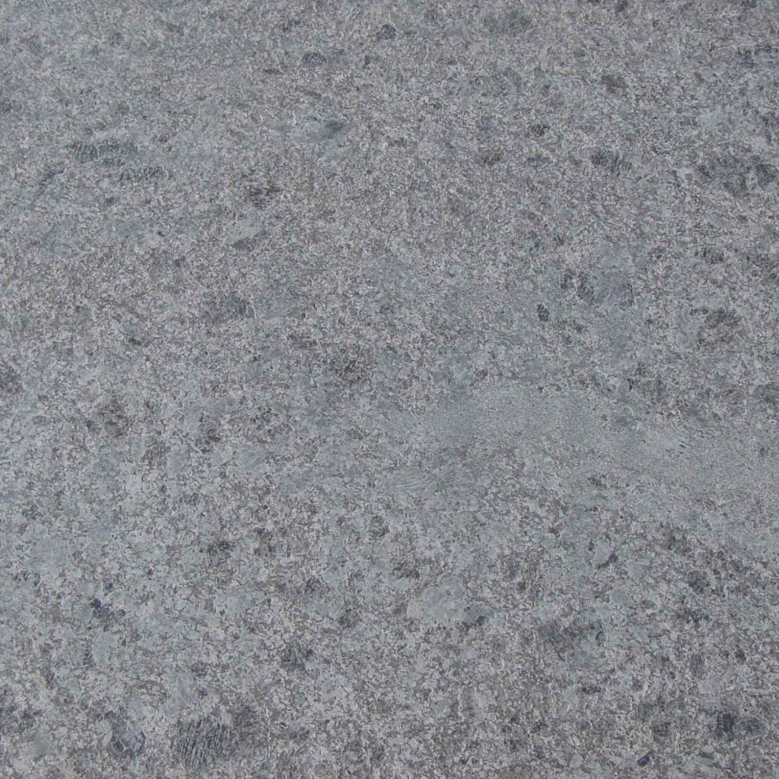 Gray speckled stone surface.