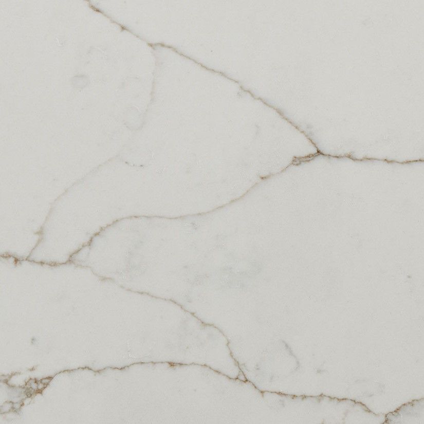 White and tan quartz countertop with veining.