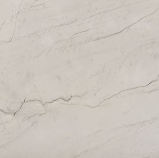 White and beige marble surface with gray veining.