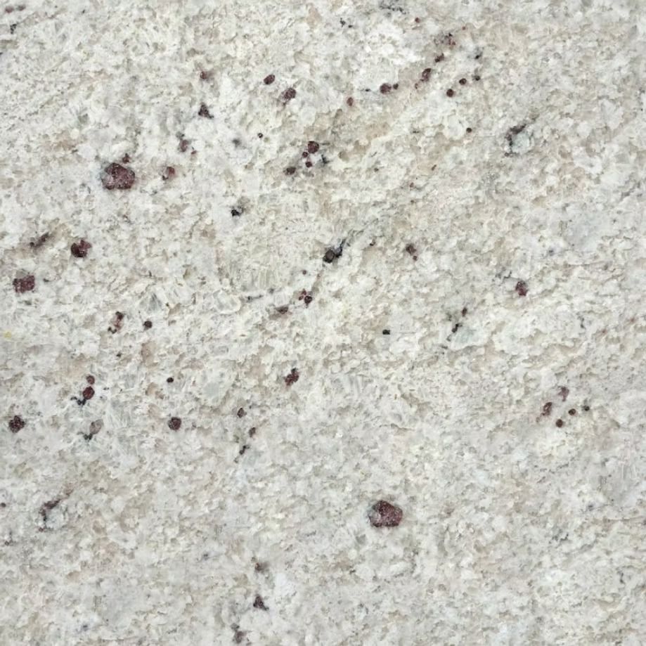 White granite with flecks of black and reddish-brown.