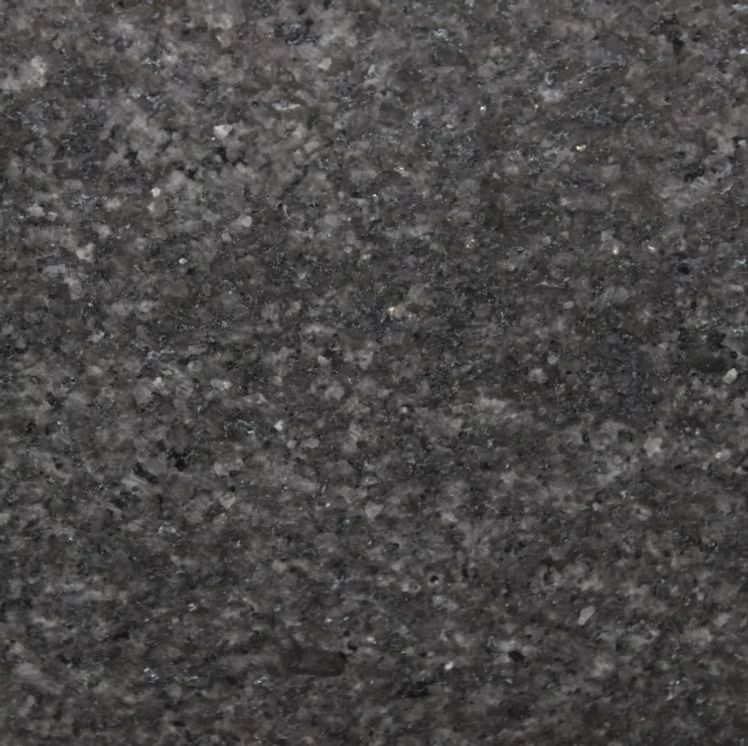 Dark gray granite surface with speckled texture.