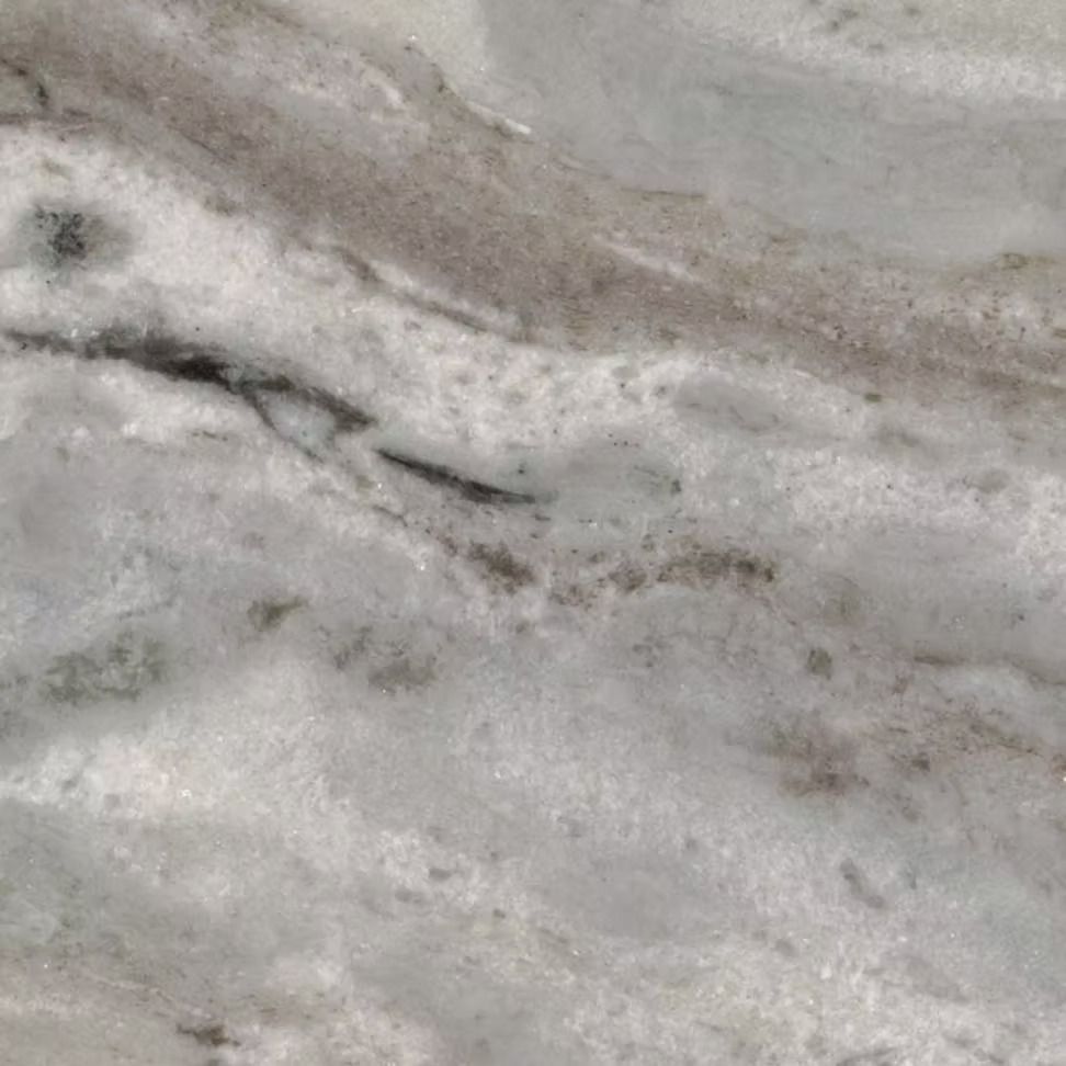 Swirling white and gray marble stone with dark gray veins.