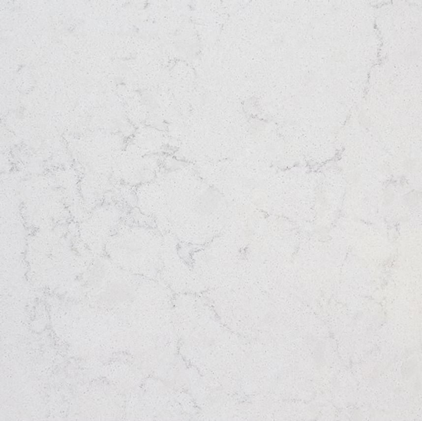 White countertop with subtle gray veining.