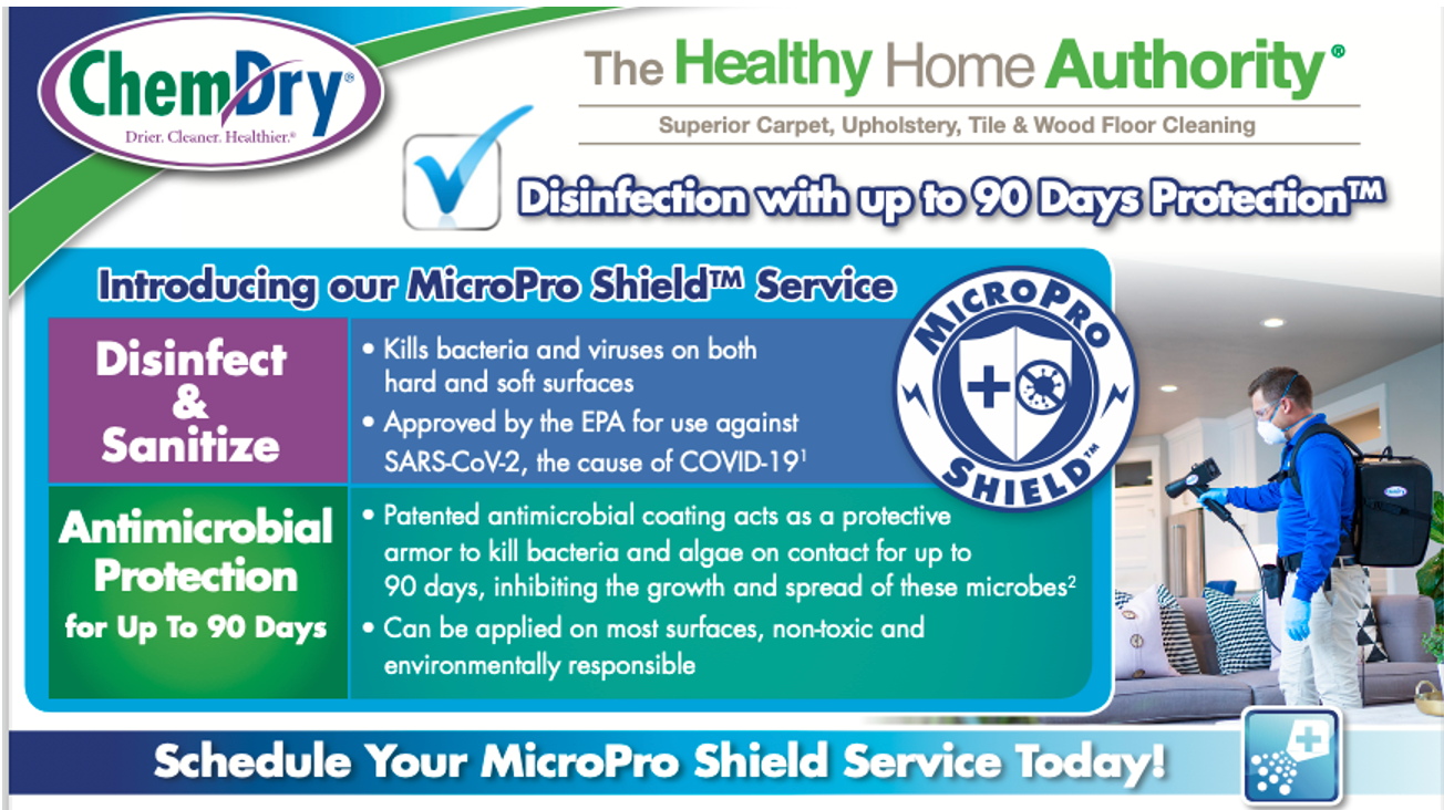 Person wearing gloves connecting gauges to an air conditioning unit.