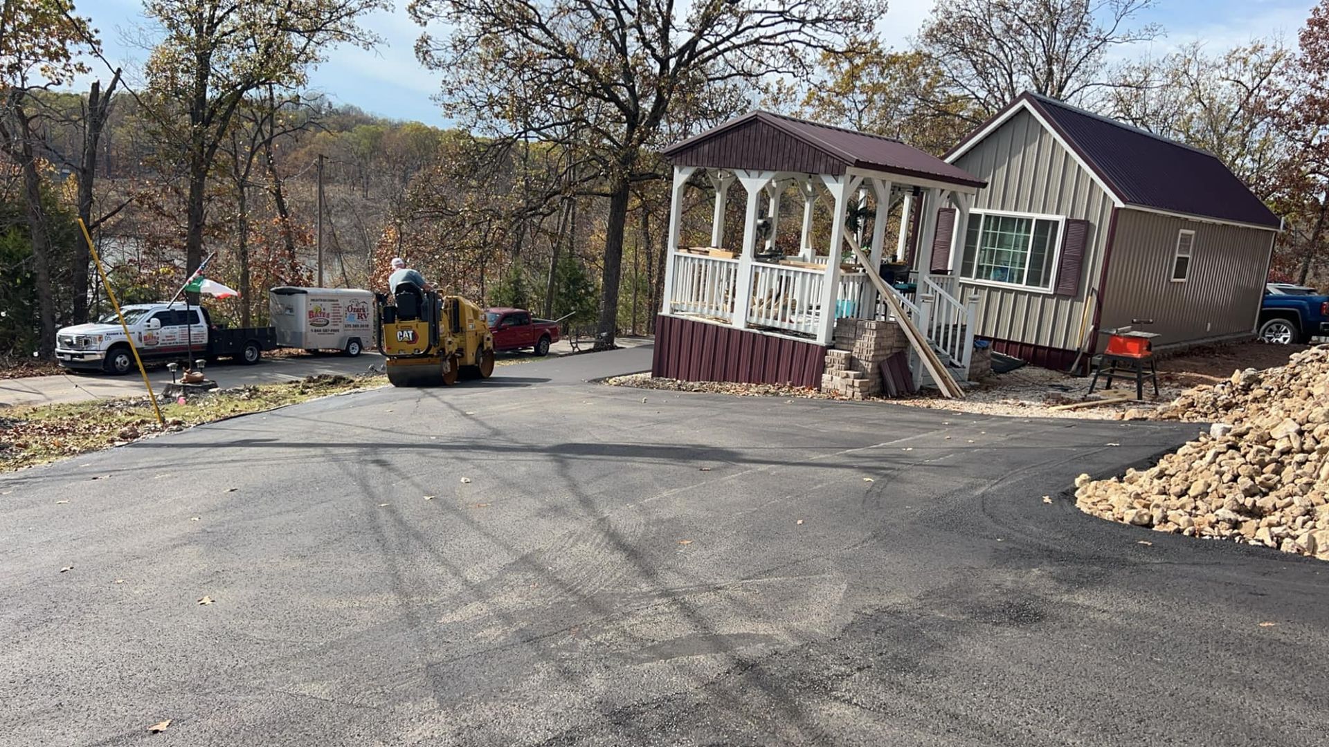 A house is being built on the side of a road.