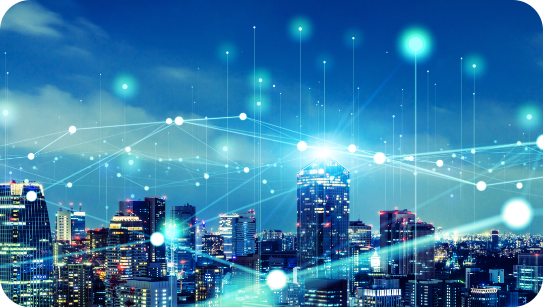 City skyline at night, with glowing blue lights and connections overlaid, suggesting technology and communication.