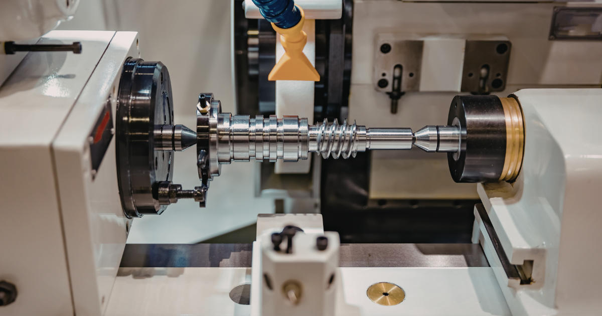 A bunch of metal pipes are stacked on top of each other.