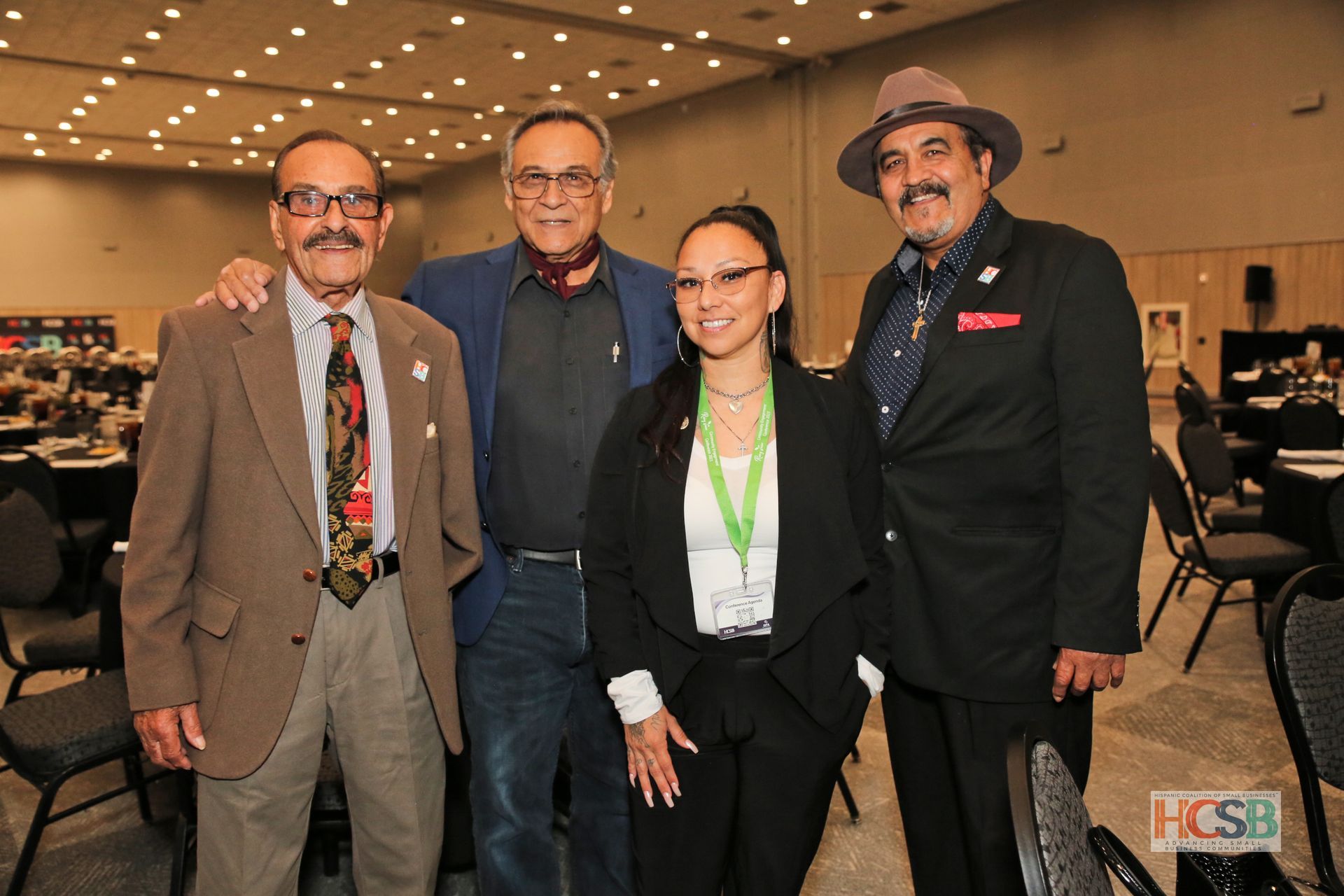 A group of people posing for a picture with the word hcsb on the bottom