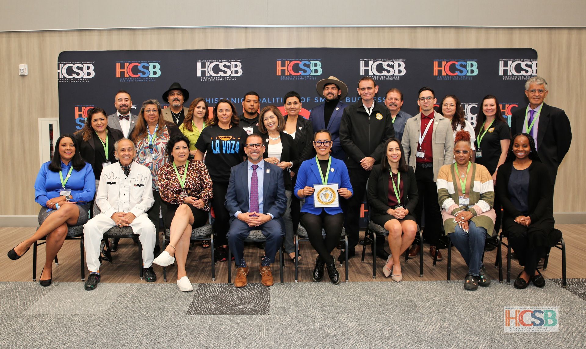 A large group of people are posing for a picture.