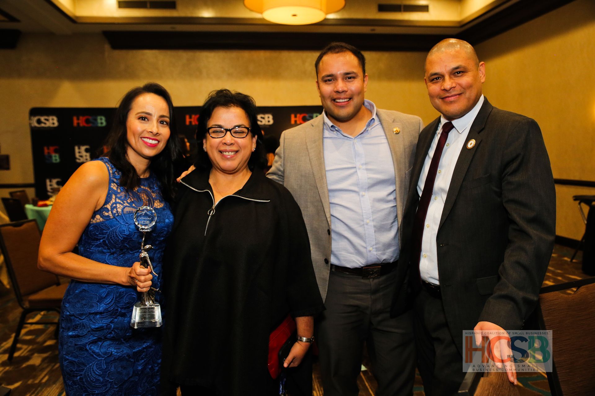 A group of people posing for a picture with the word hcsb on the bottom
